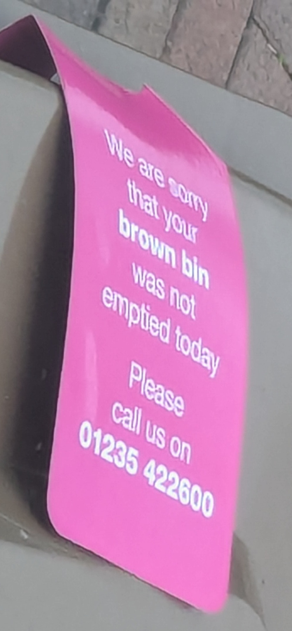 Silly notice on bin